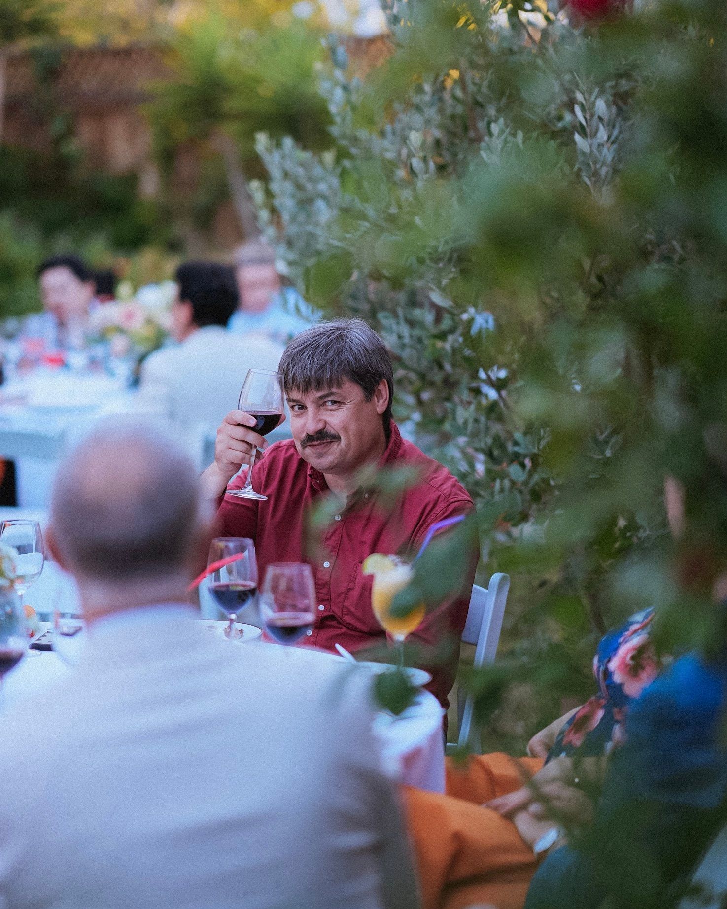Couple toasting at a Bay Area party in California Couple toasting at a Bay Area party in California
